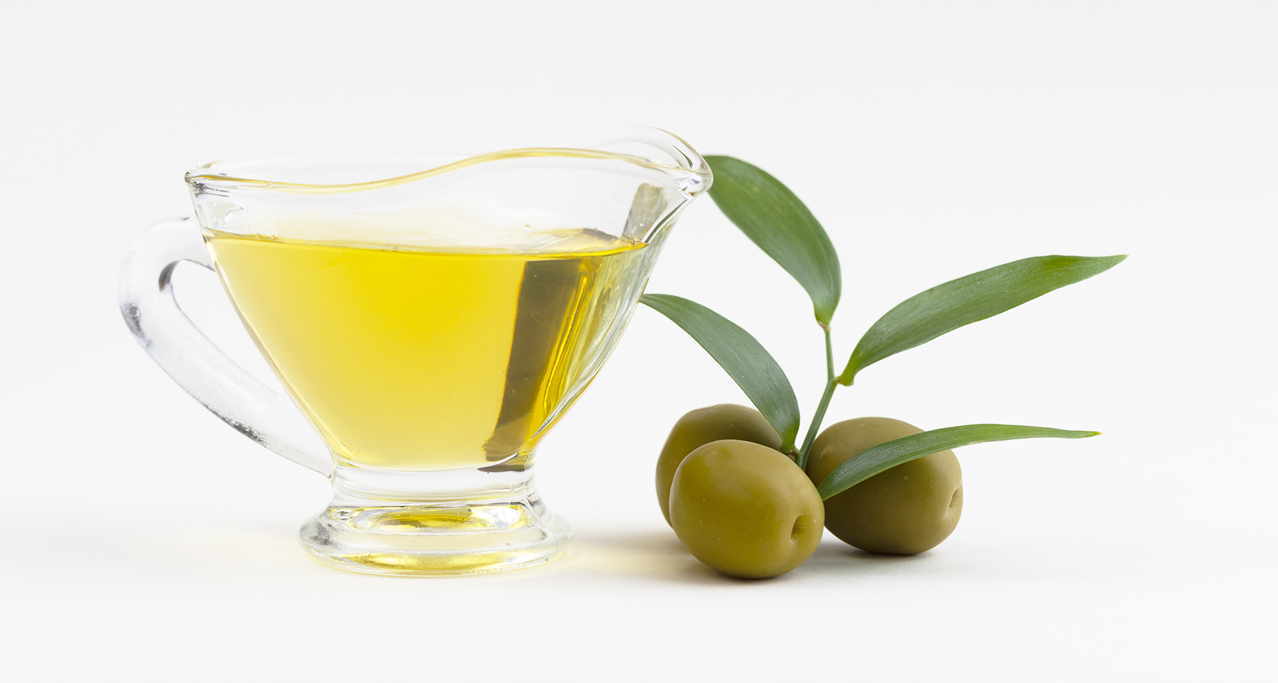 Olive Trees Background On Blurred Background. Olive Trees On A Grove In Salento, Puglia, Italy